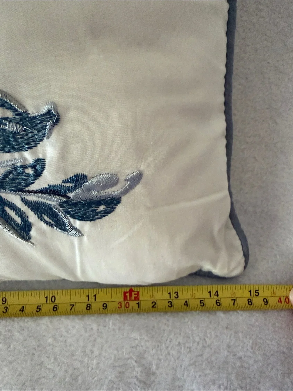 Madison Park Cream Throw Pillow with Blue and Gray Floral Embroidery